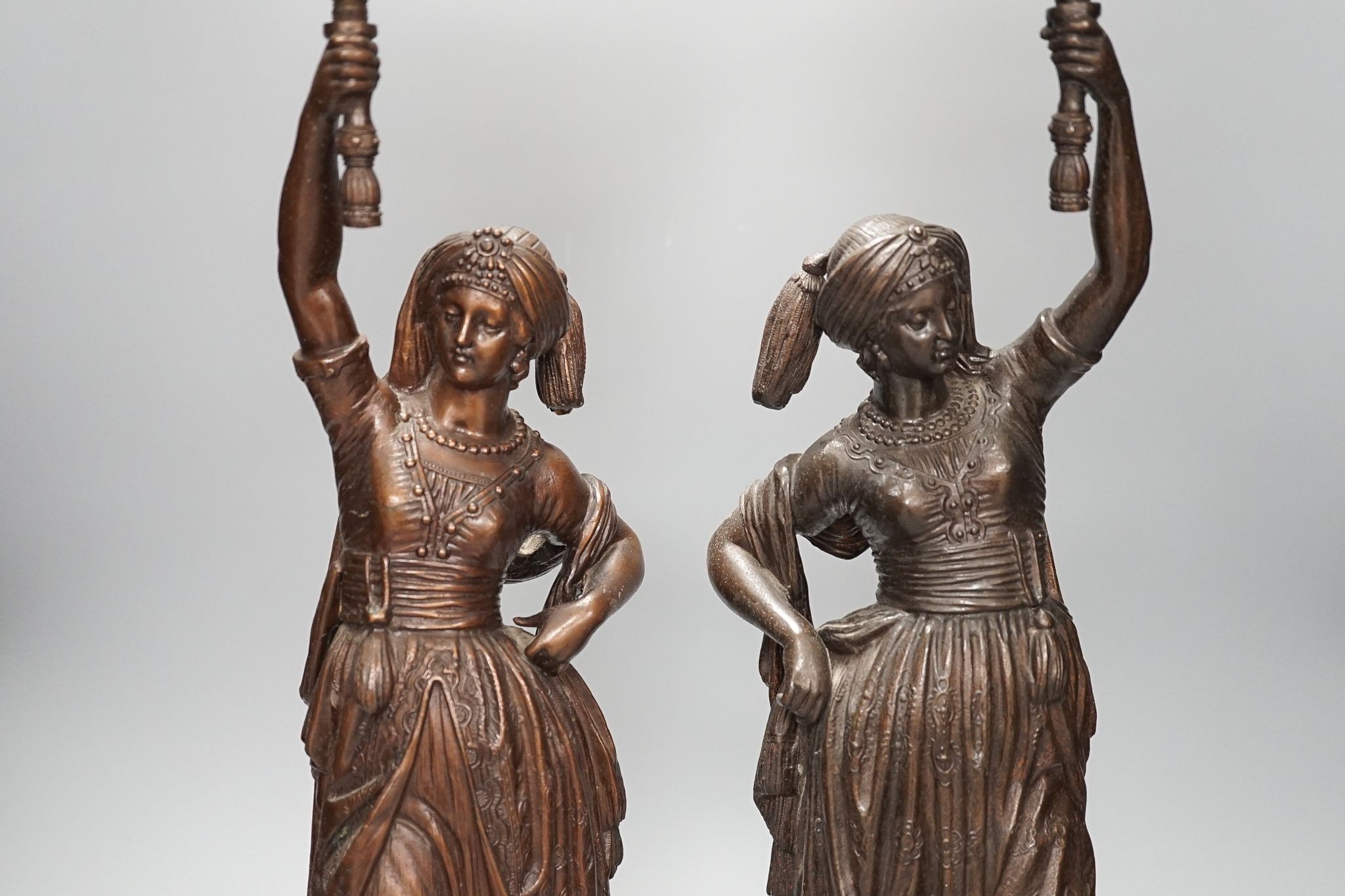 A pair of spelter figural table lamps, 50cm